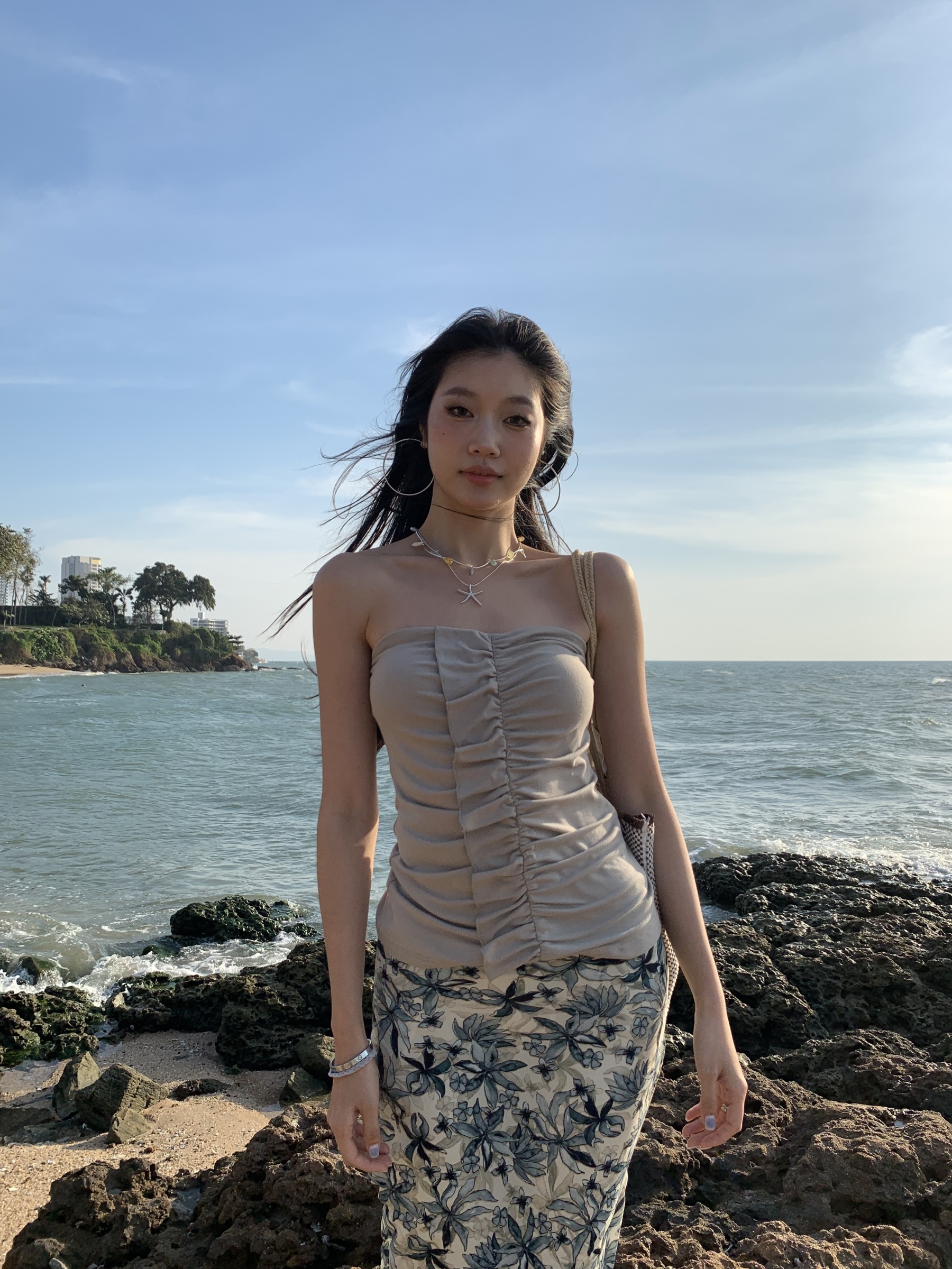 A tube top with a ruffled design, a tight waist, and a hot style.