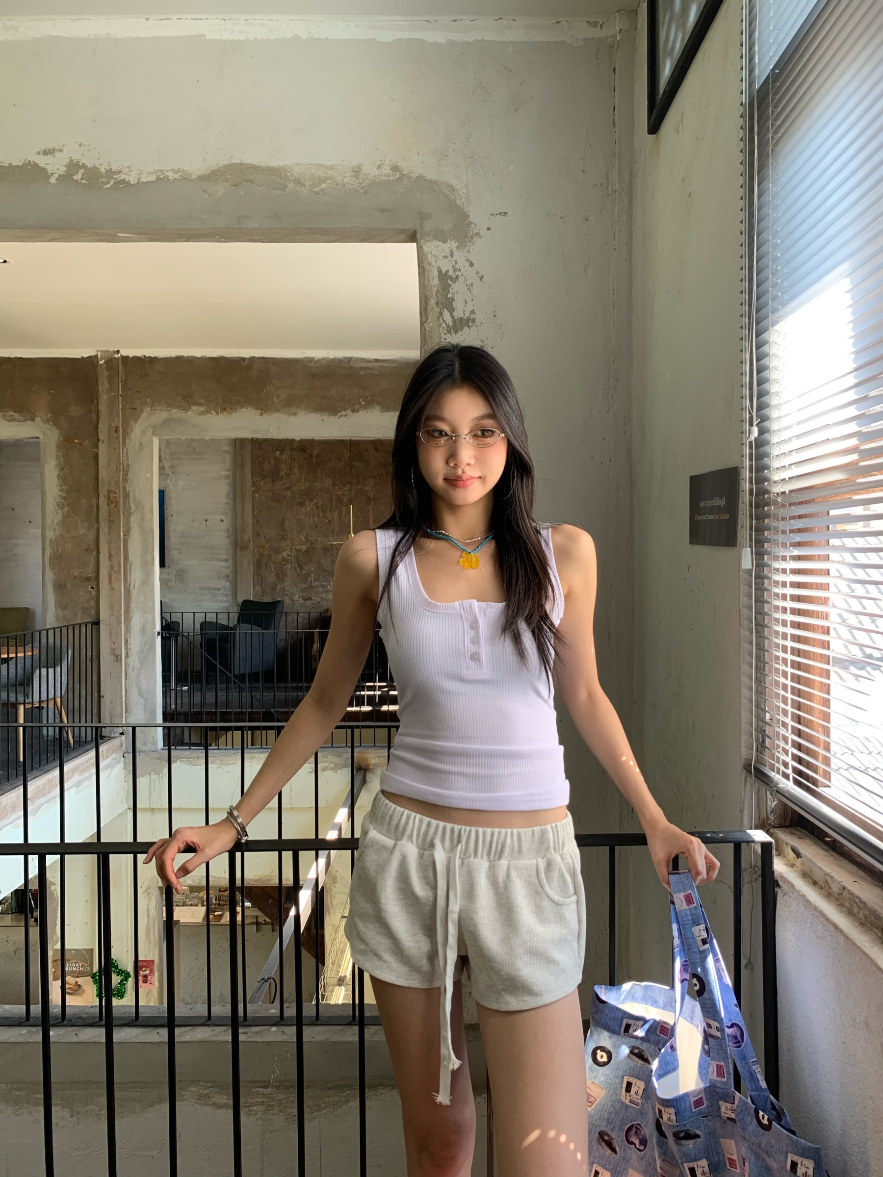 Two-tone button-up vest with a slim-fit design that helps tighten the waist