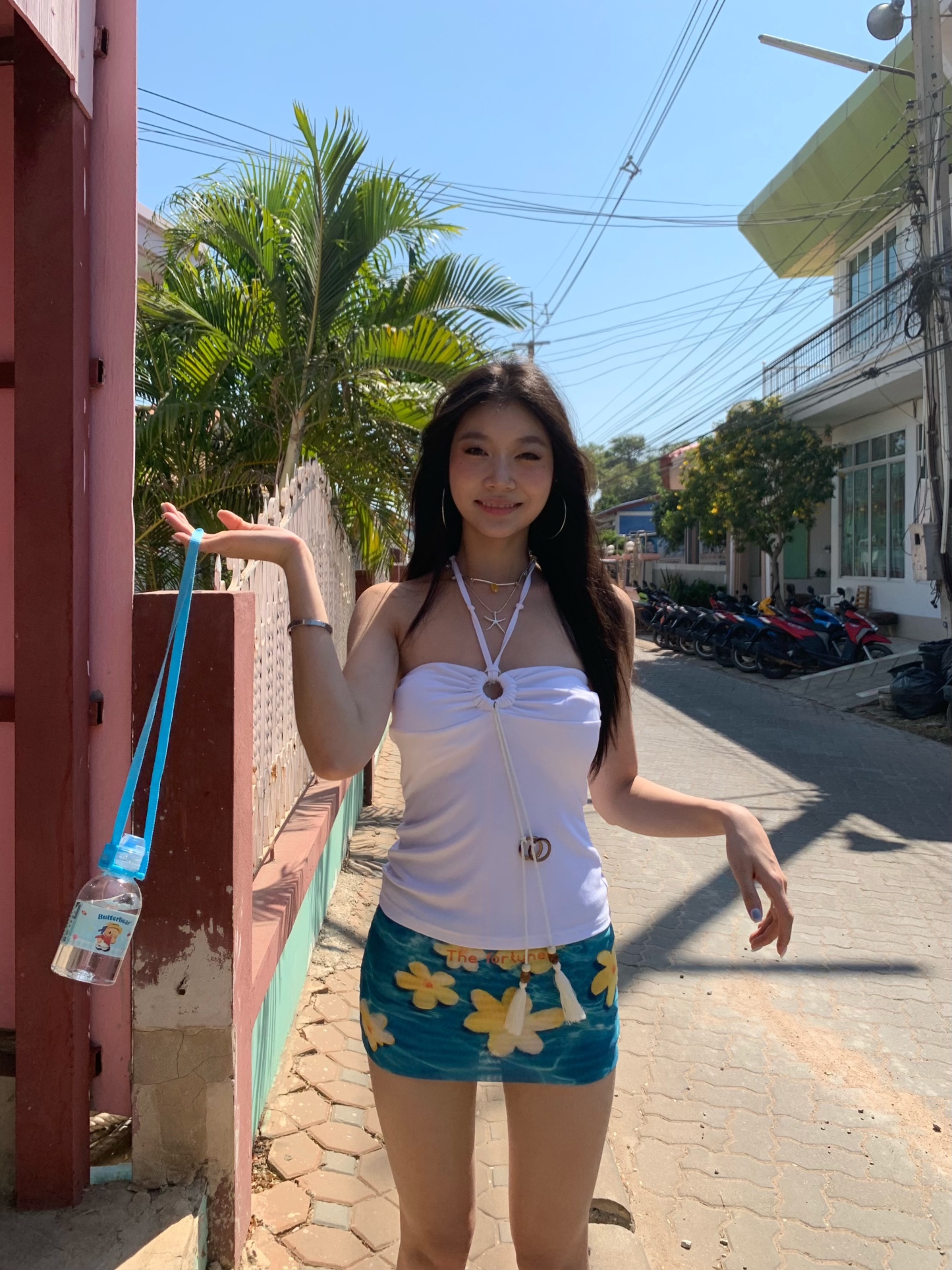 (Very short) low-waist pencil skirt, mesh fabric with frangipani pattern, with lining