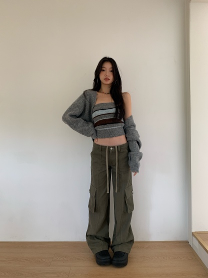 Two-piece set consisting of a two-tone striped knit tube top and a long-sleeve cardigan.