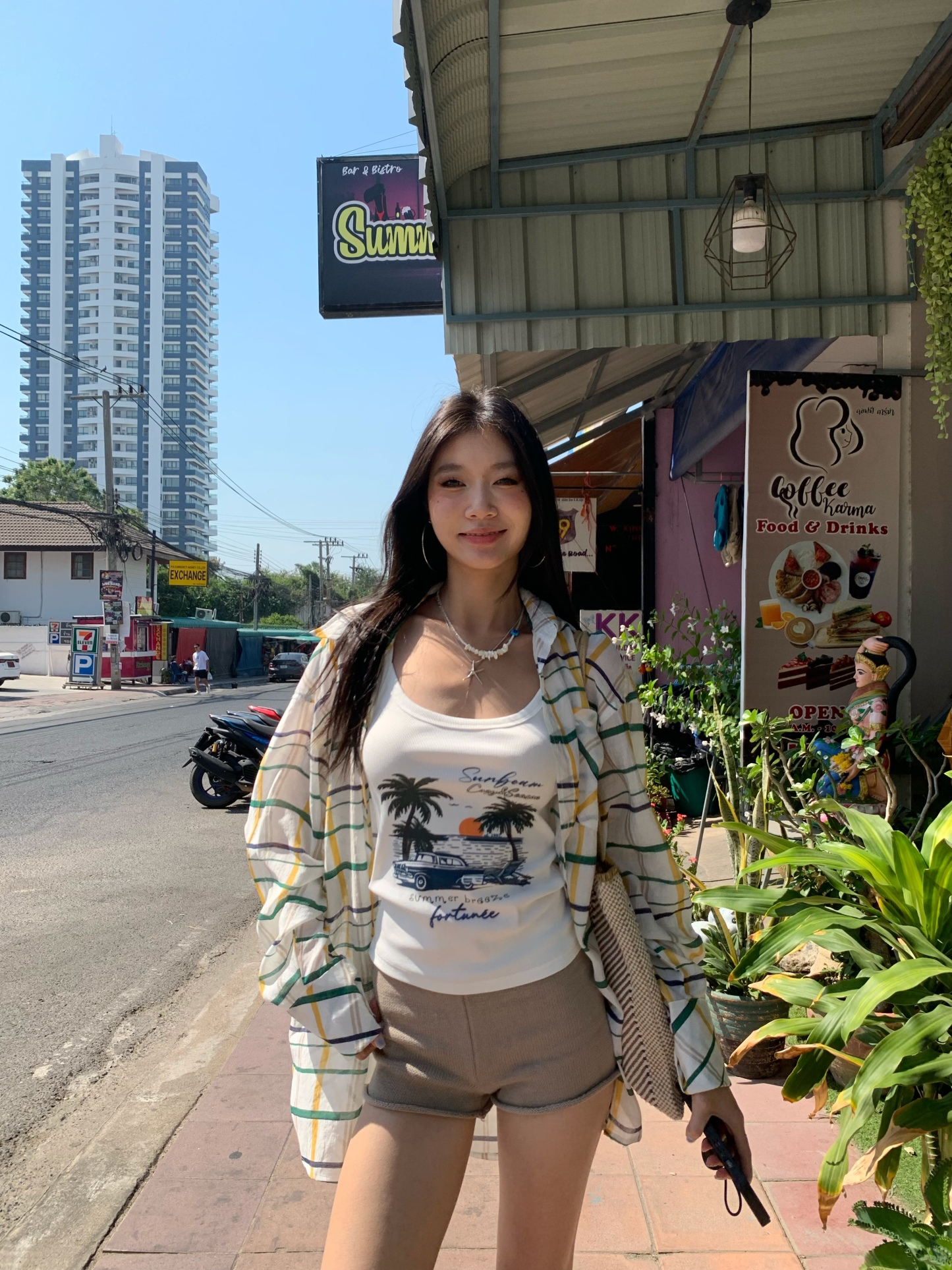 A colorful plaid shirt for summer. Lightweight fabric, loose long sleeves and sun protection.