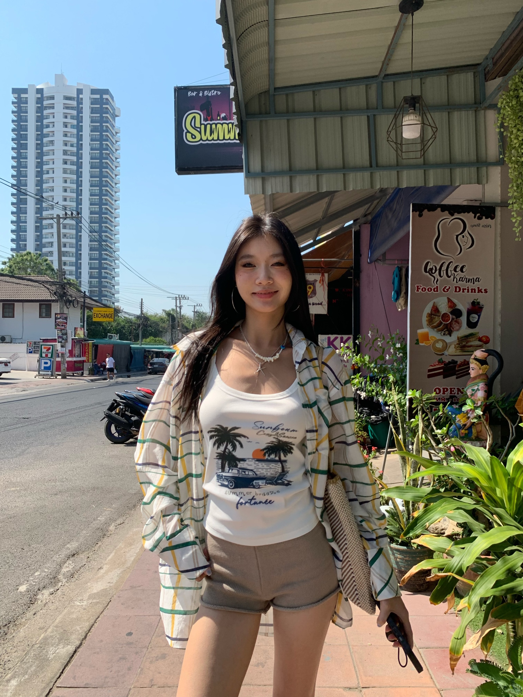 A colorful plaid shirt for summer. Lightweight fabric, loose long sleeves and sun protection.