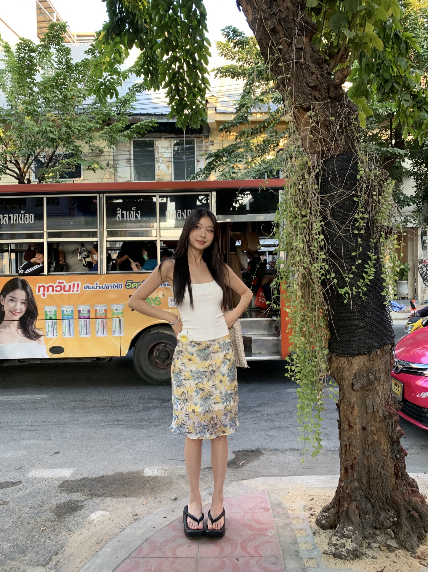 Mid-length skirt with ruffled edge design and multi-colored floral print