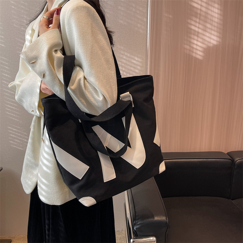 韓版質感厚實雙面壓花字母帆布手提袋-lululam