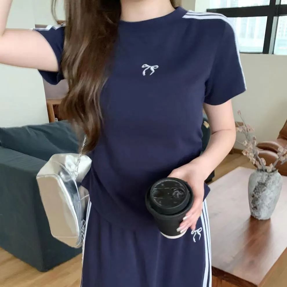 【套裝】慵懶風休閒時尚短袖t恤高腰A字裙運動風兩件套裝-lululam