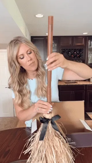 Floating-style witch broom moving Halloween decor