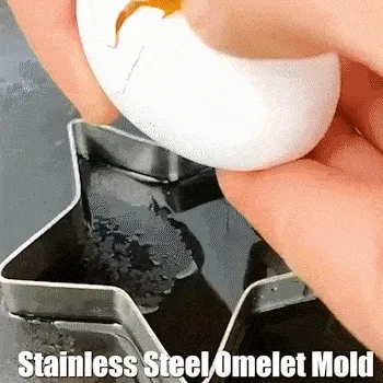 Stainless steel egg molds being used in a frying pan