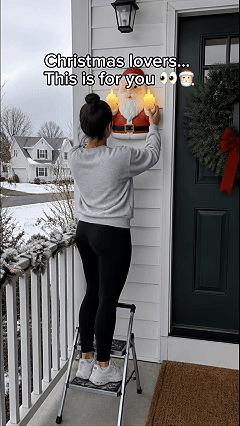 Cheeky middle finger Santa with glowing hands outdoor wall decoration animation