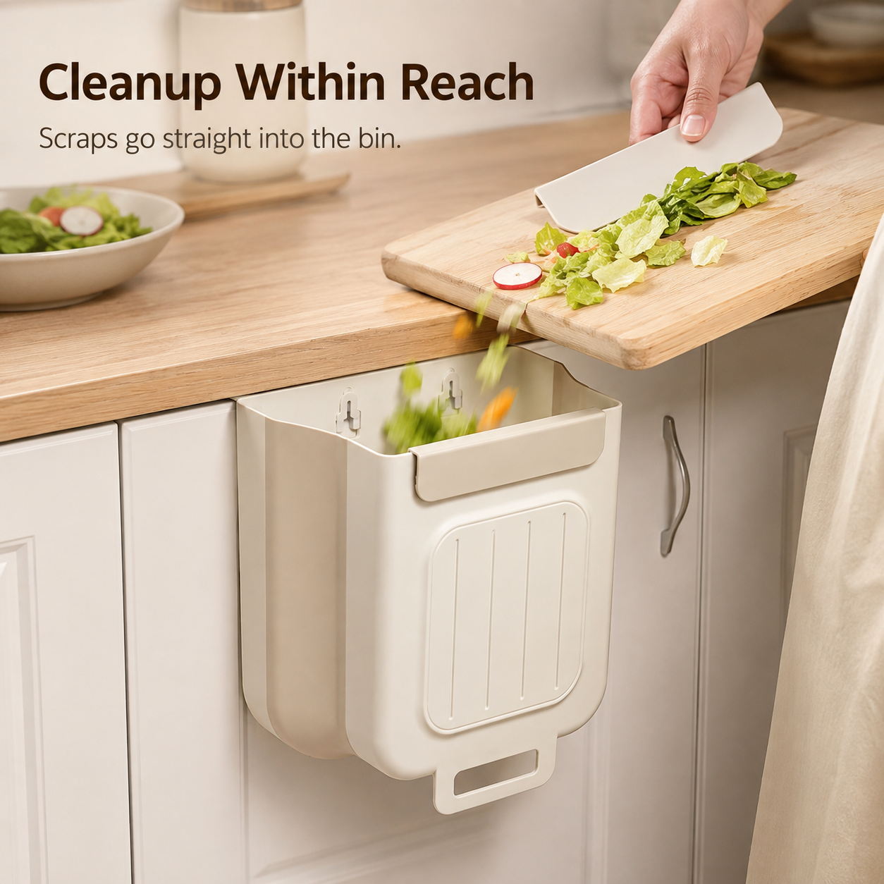 Scraping vegetable peelings directly into wide mouth bin