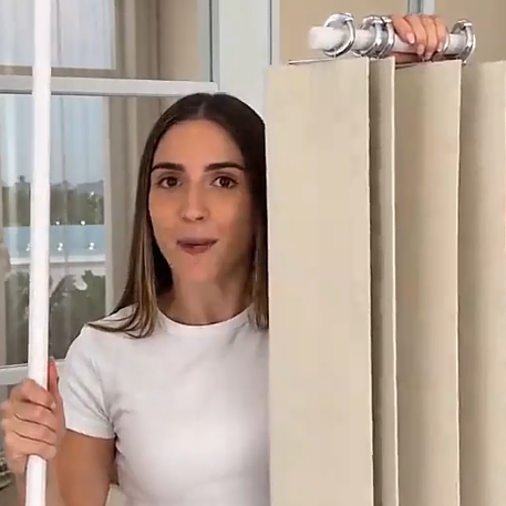 Accordion curtain used as a closet and doorway cover