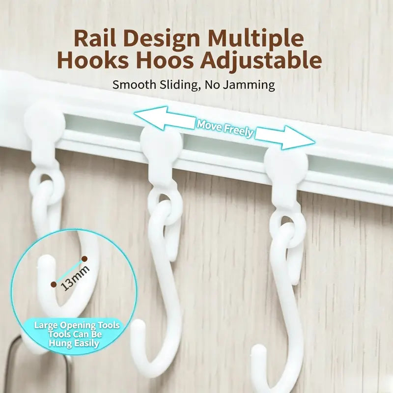 Inside view of kitchen cabinet door with hanging utensils rail