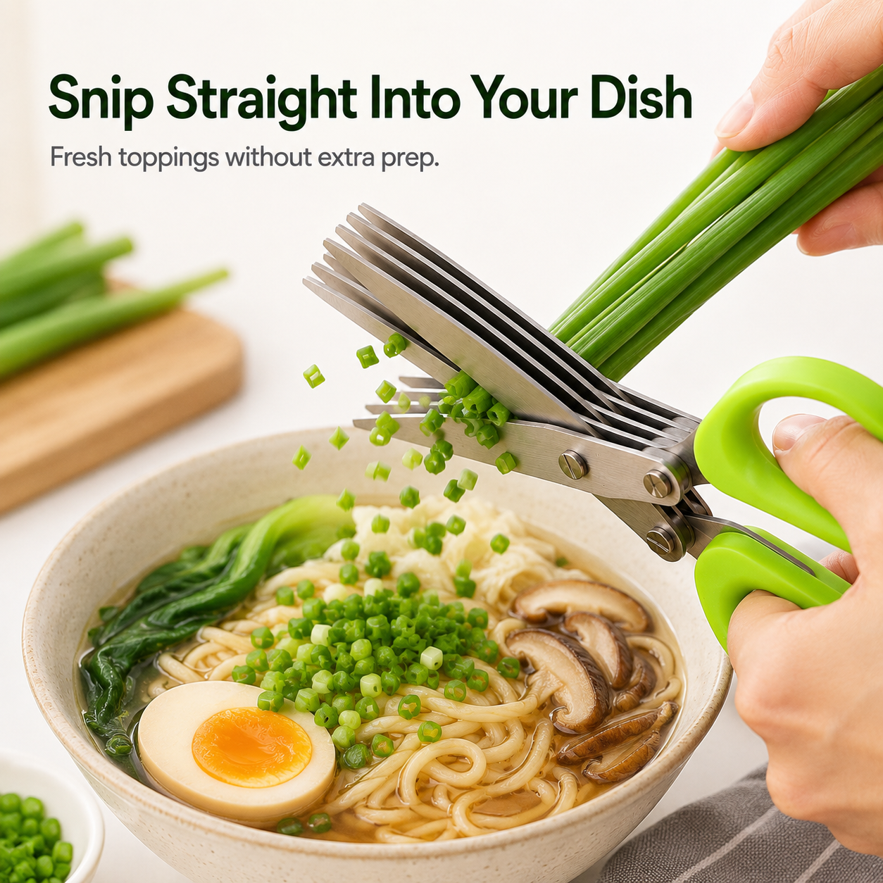 Snipping scallions directly over ramen bowl with 5 blade scissors