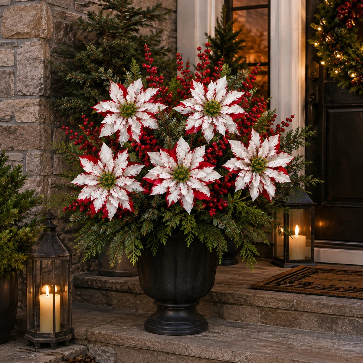 Christmas poinsettia arrangement displayed in porch planter