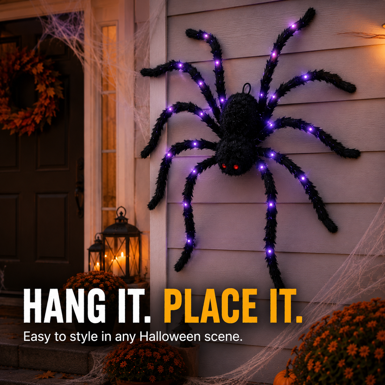Giant glowing spider on front porch with pumpkins and cobwebs