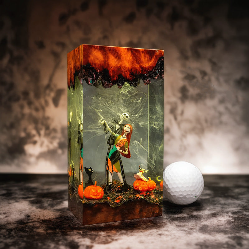 Nighttime glowing Halloween resin diorama lamp purple and orange light effect