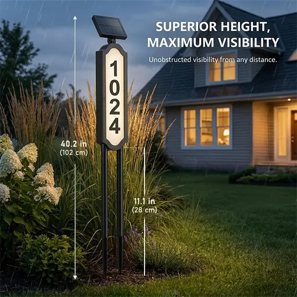 Tall solar house number light visible from the street