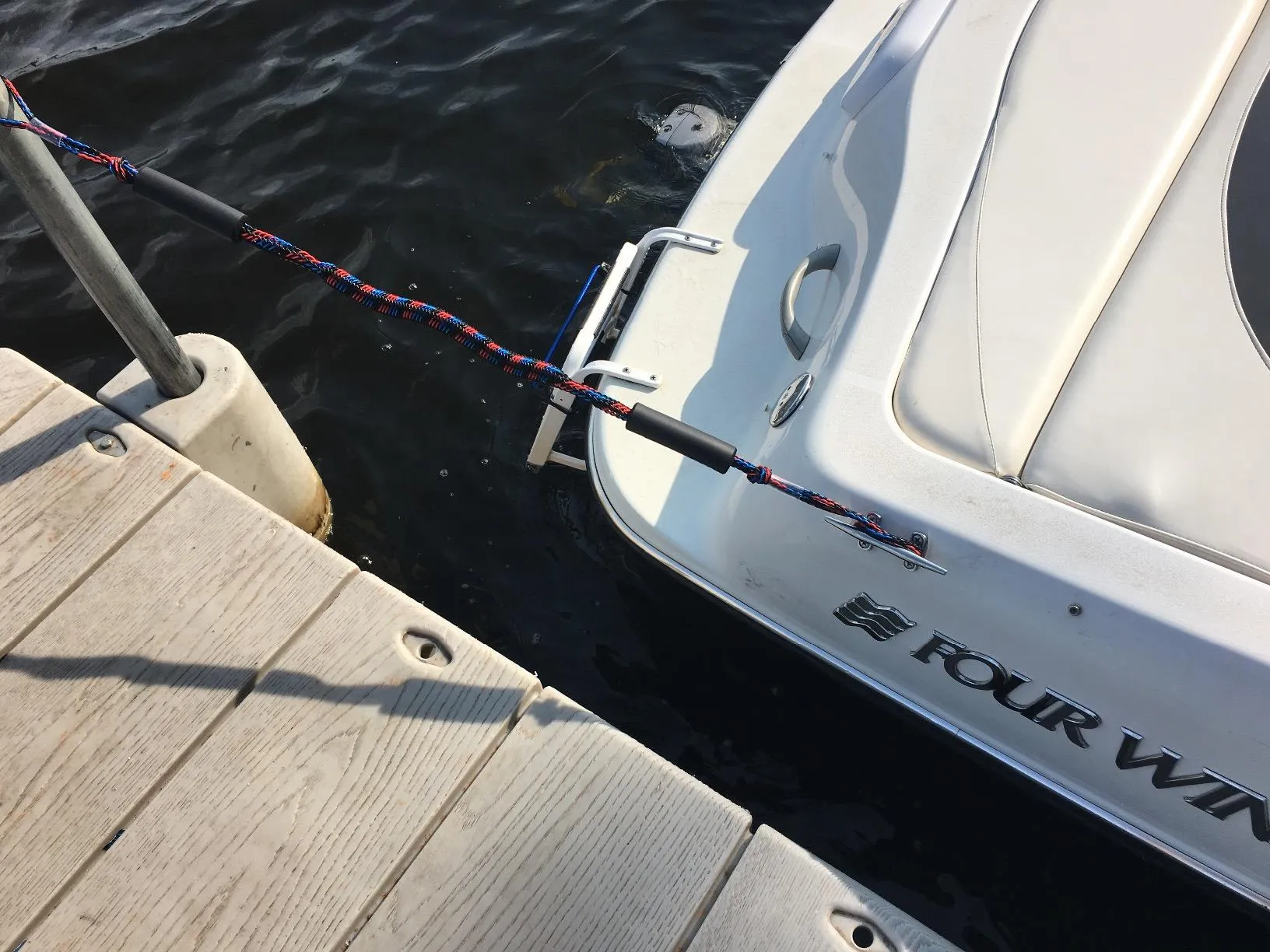 Customer boat secured with a bungee dock line