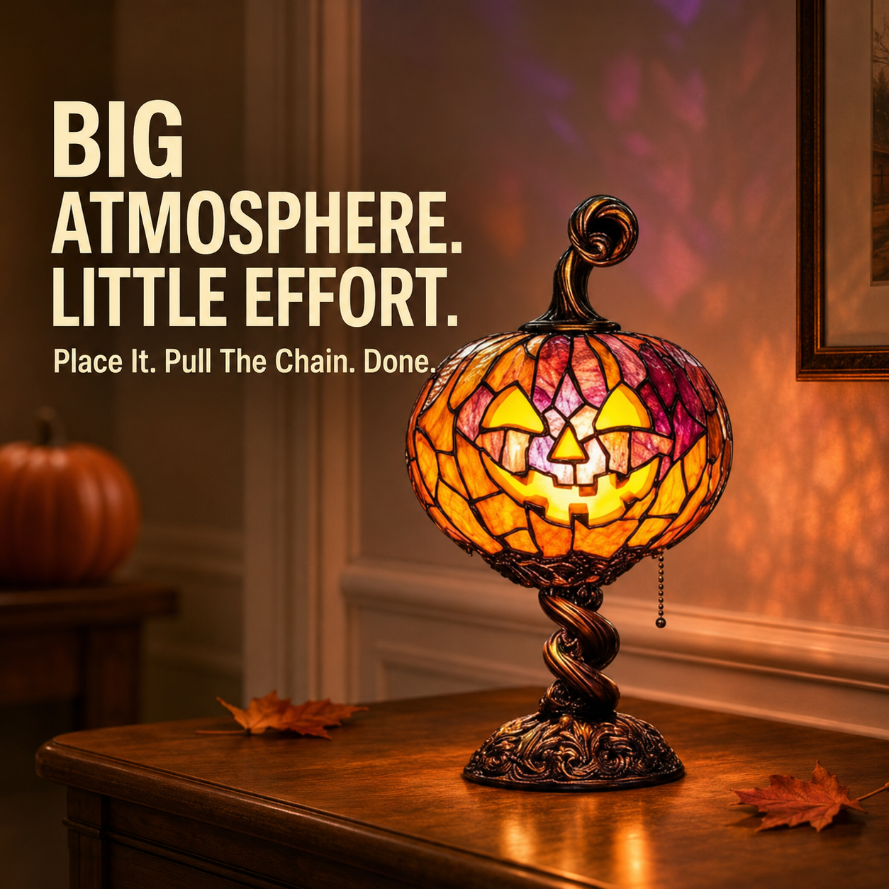 Halloween Pumpkin Glow Lamp lit up on a table
