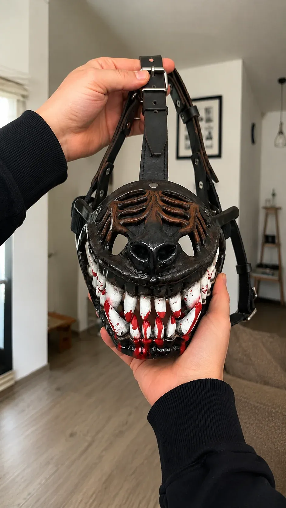 Dog wearing a monster muzzle for a Halloween costume