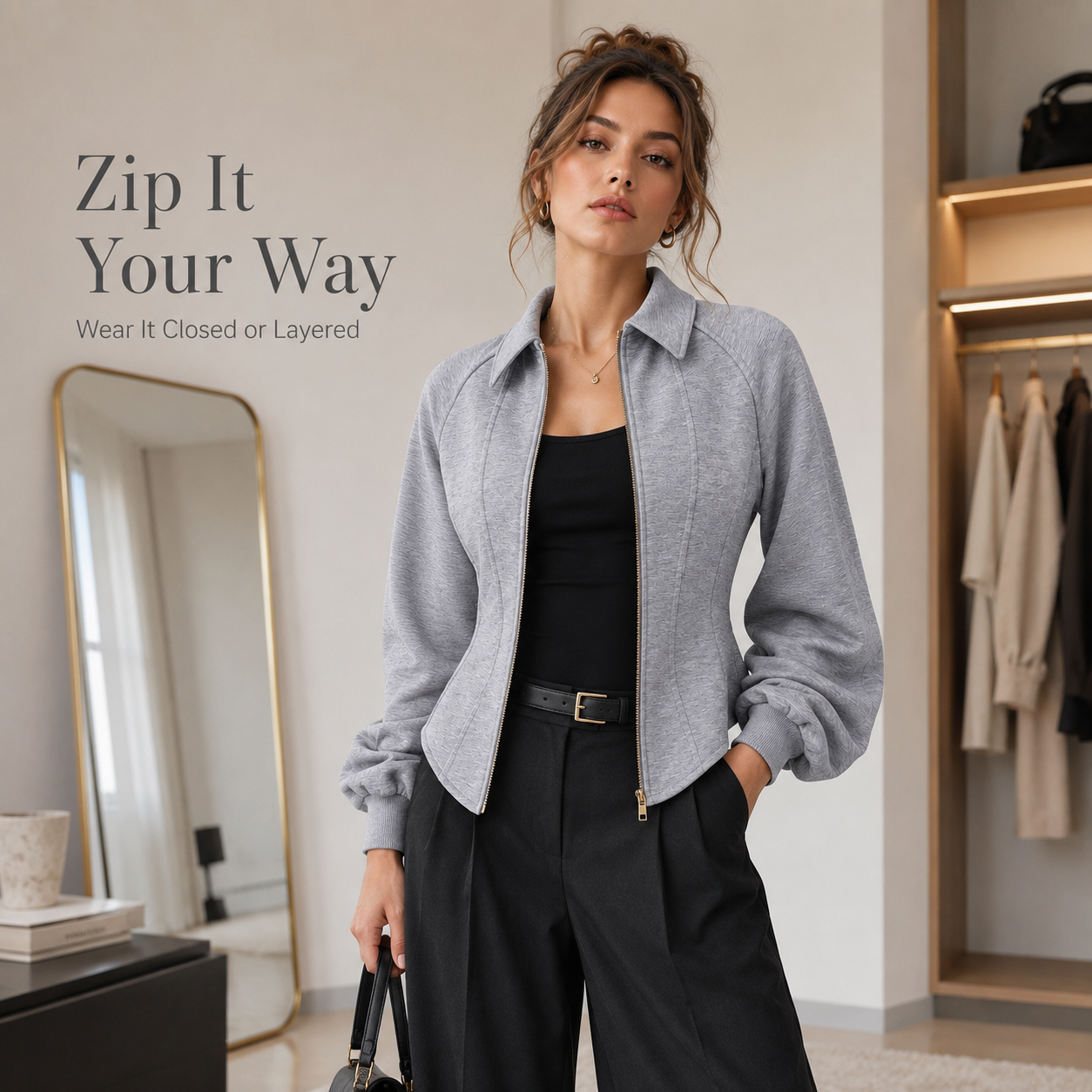 Rear back view of model wearing grey sculpted zip jacket