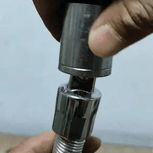 Flexible extension rod loosening bolts at awkward angles in engine bay