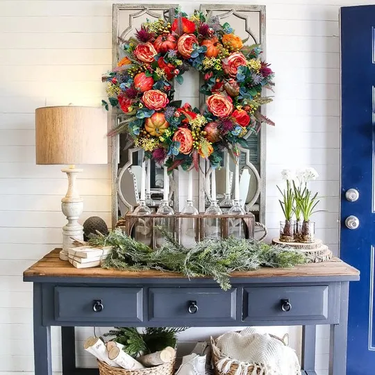 Peony pumpkin wreath styled on cozy front porch door for autumn decor