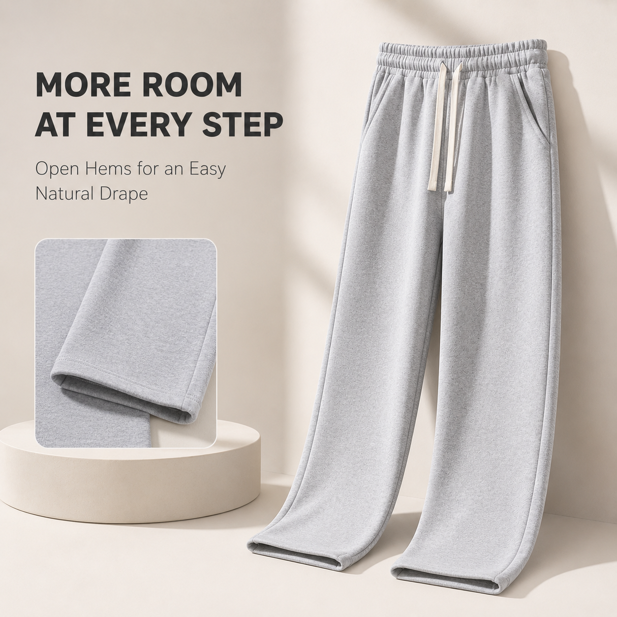 Straight leg sweatpants with functional side pockets and smooth open drape