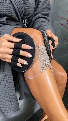 Soft rubber shower scrubber creating a rich lather
