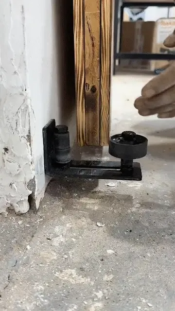 Adjustable barn door floor guide black steel bottom roller for sliding doors GIF