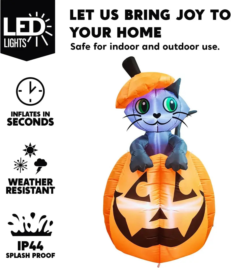 Halloween inflatable cat on pumpkin with stakes ropes and sandbags for stability