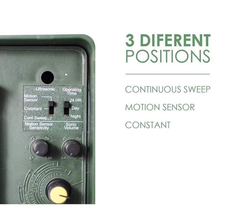 Close-up of the woodpecker ultrasonic repeller control switch settings including motion sensor, constant, and continuous sweep modes.