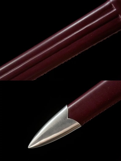 Close-up of the durable leather scabbard and protective steel chape of the battle-ready medieval longsword.
