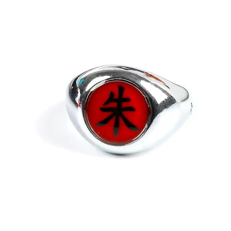 A detailed close-up of the red and black Akatsuki member ring included in the Naruto set.