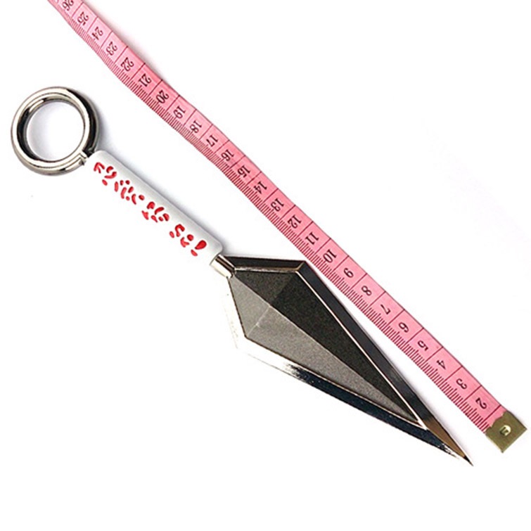 A metal Naruto kunai knife prop shown with a measuring tape to clearly display its actual size and dimensions.