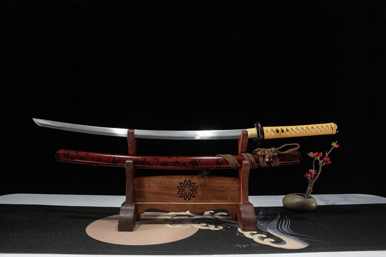 Unsheathed 1060 carbon steel reverse-blade katana displayed on a stand, showing the sharpened inner edge.