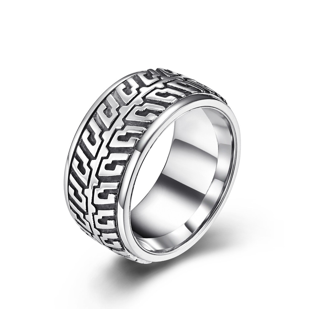 Silver stainless steel motorcycle tire tread spinner ring for men on a white background.