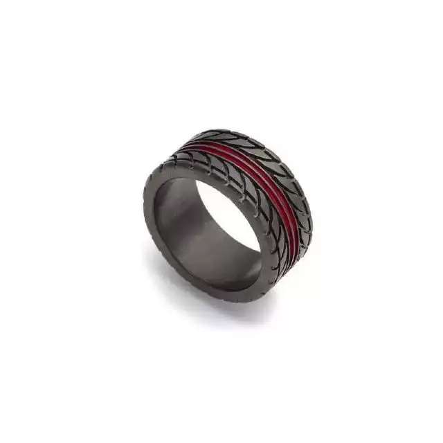 An angled close-up view on white background of a black motorcycle tire tread pattern wedding band with a thin red accent line.