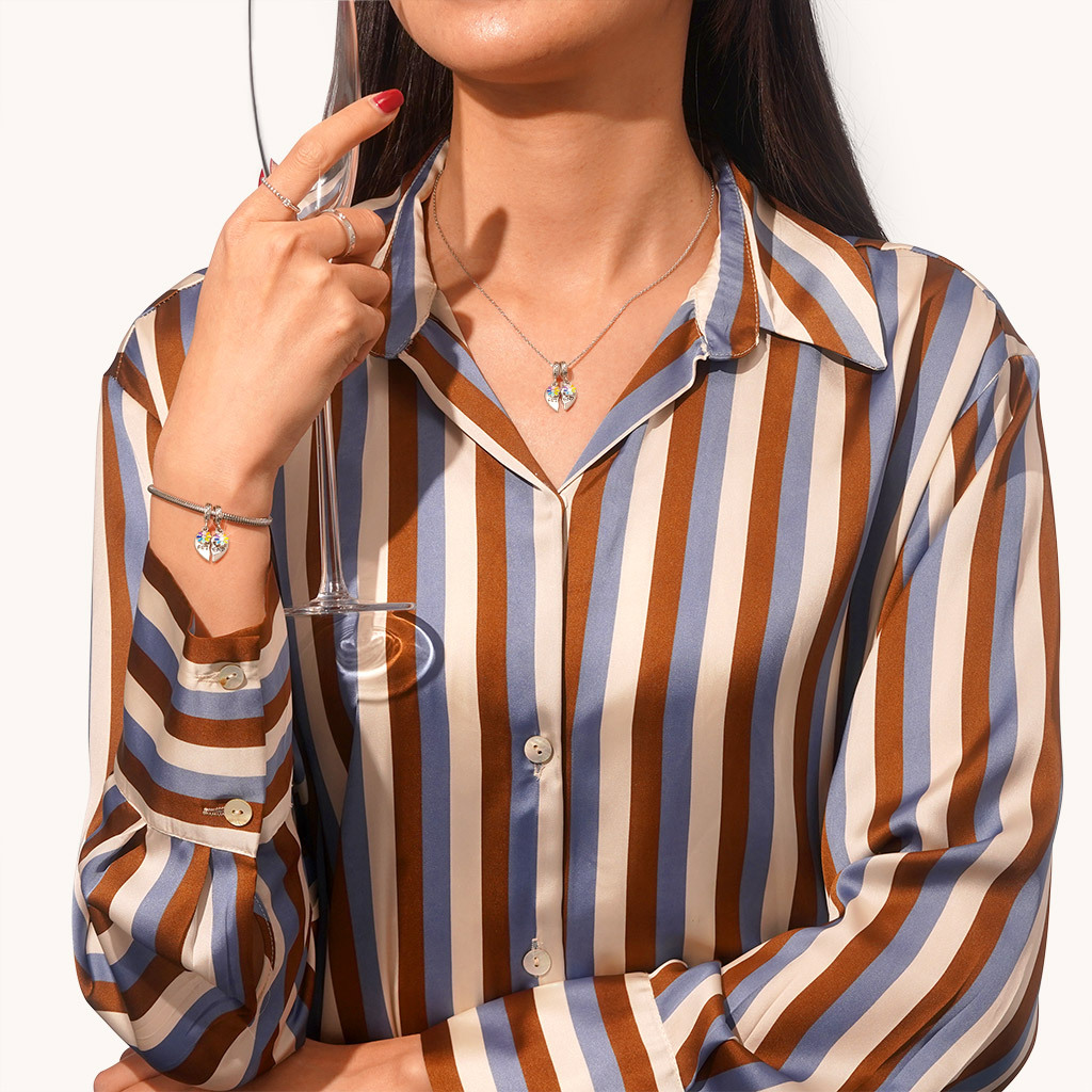 

จี้หัวใจคู่สายรุ้ง image number 4