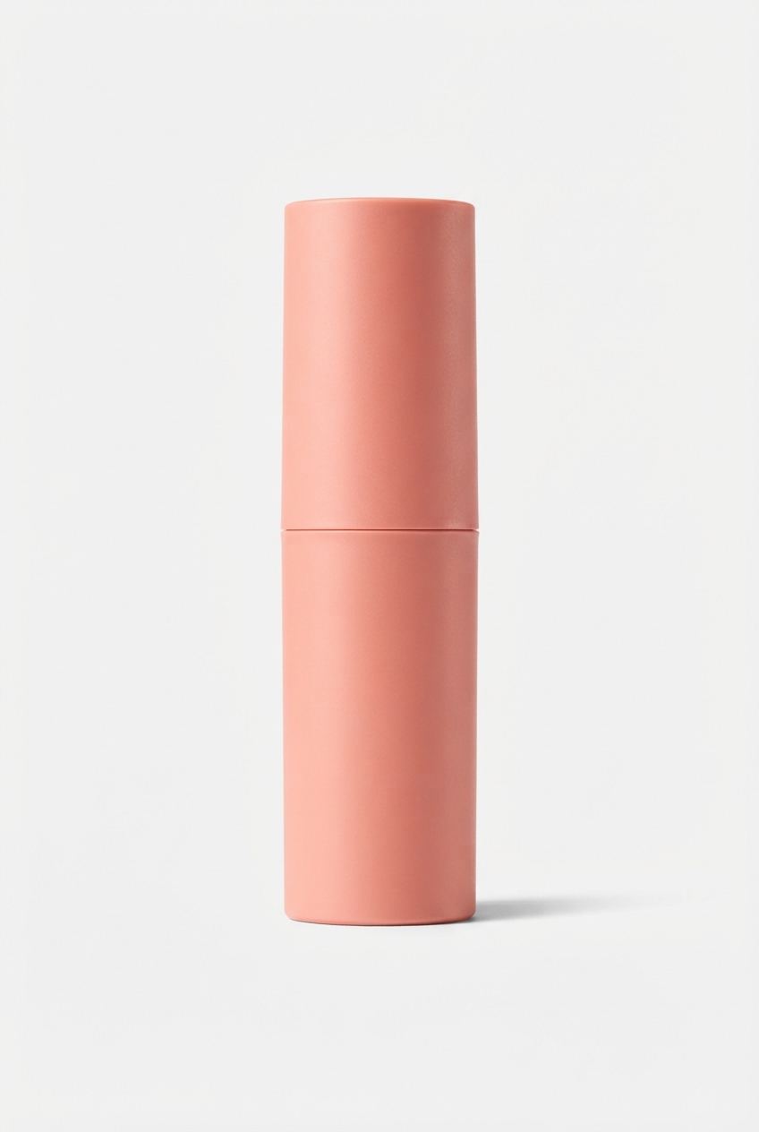 Lightcoral cream blush stick on minimalist off-white background