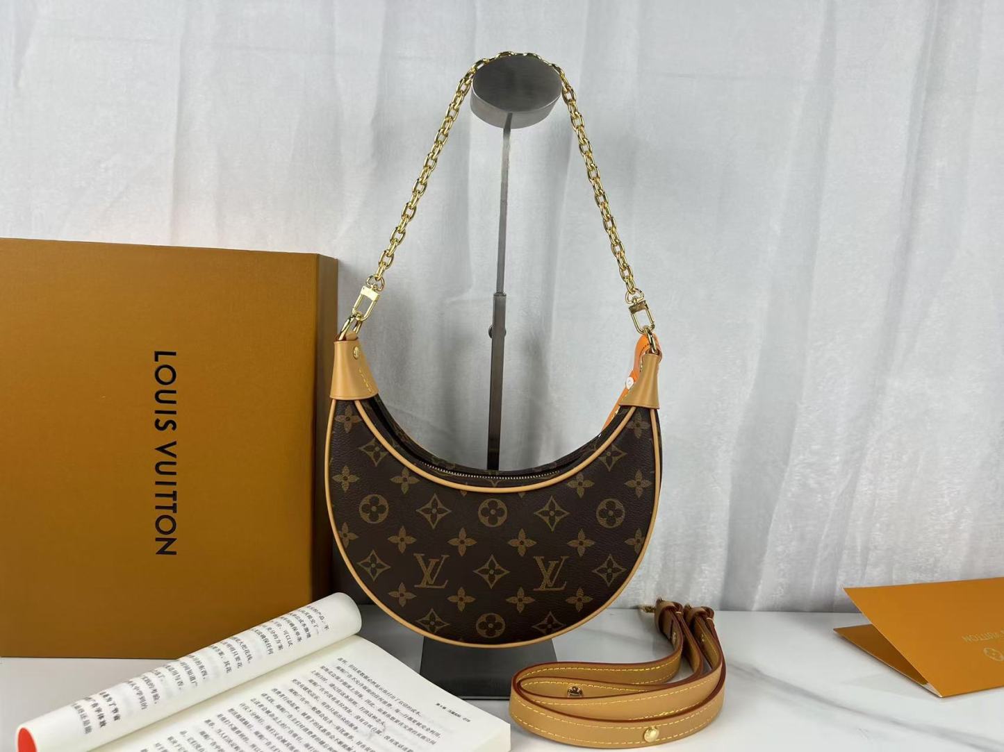 Louis Vuitton Half moon bag
