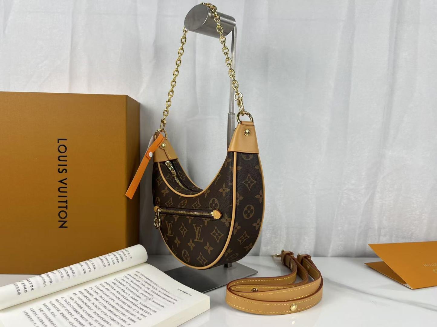 Louis Vuitton Half moon bag