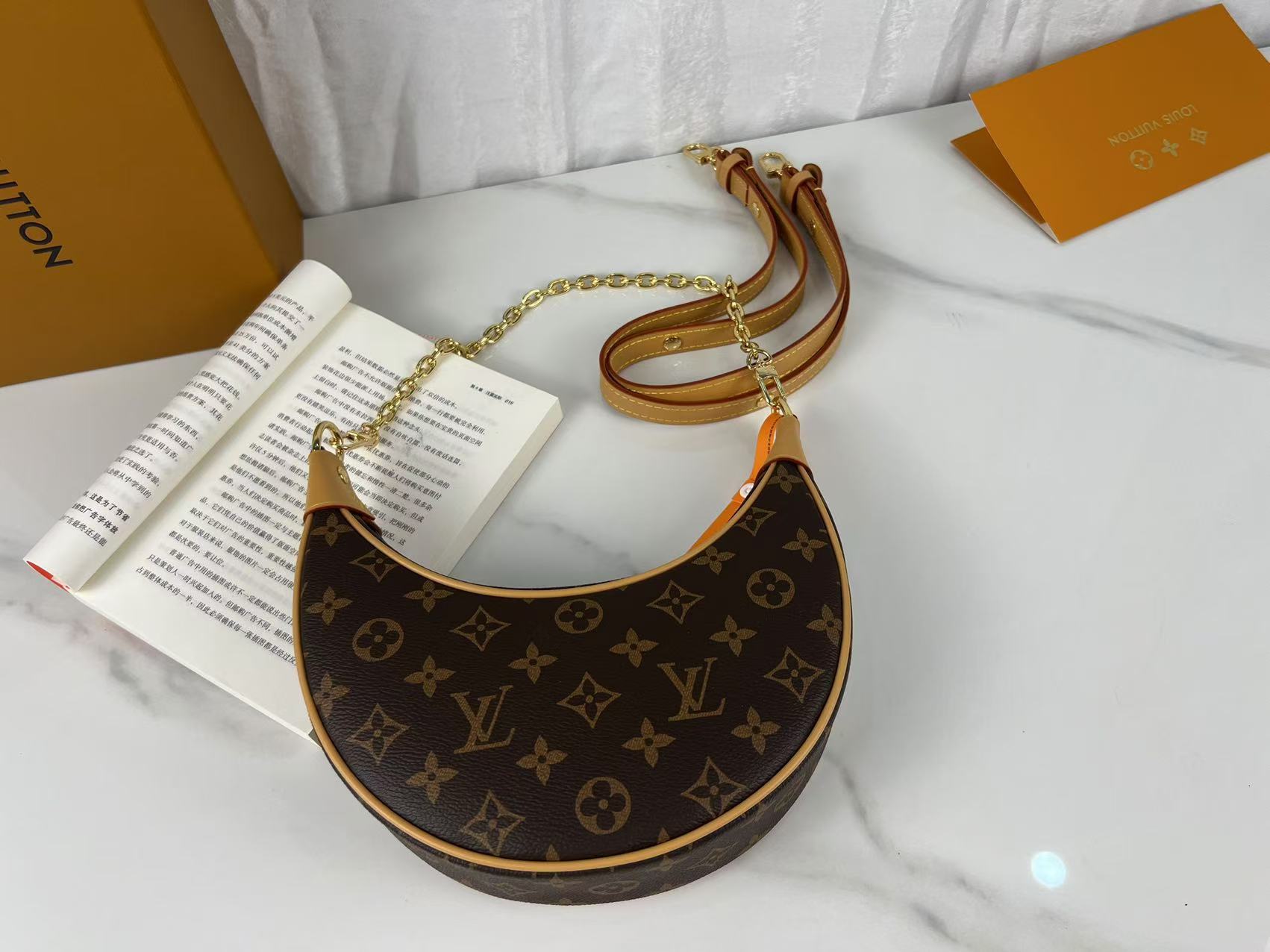 Louis Vuitton Half moon bag