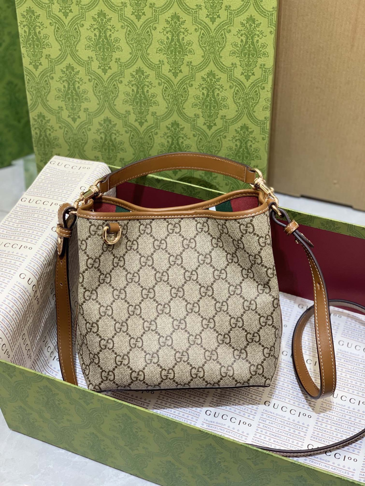 GUCCI GG EMBLEM MINI BUCKER BAG