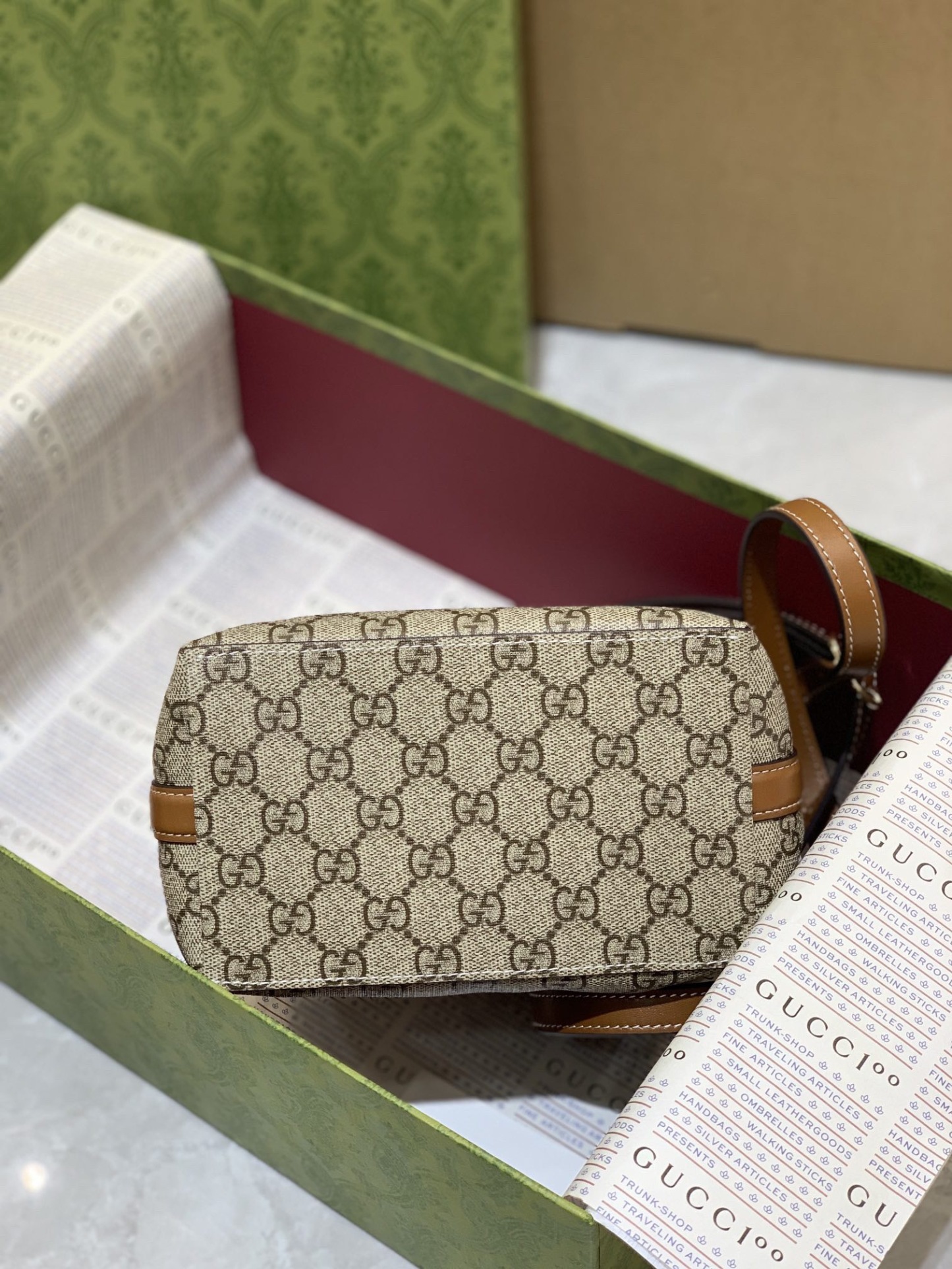 GUCCI GG EMBLEM MINI BUCKER BAG