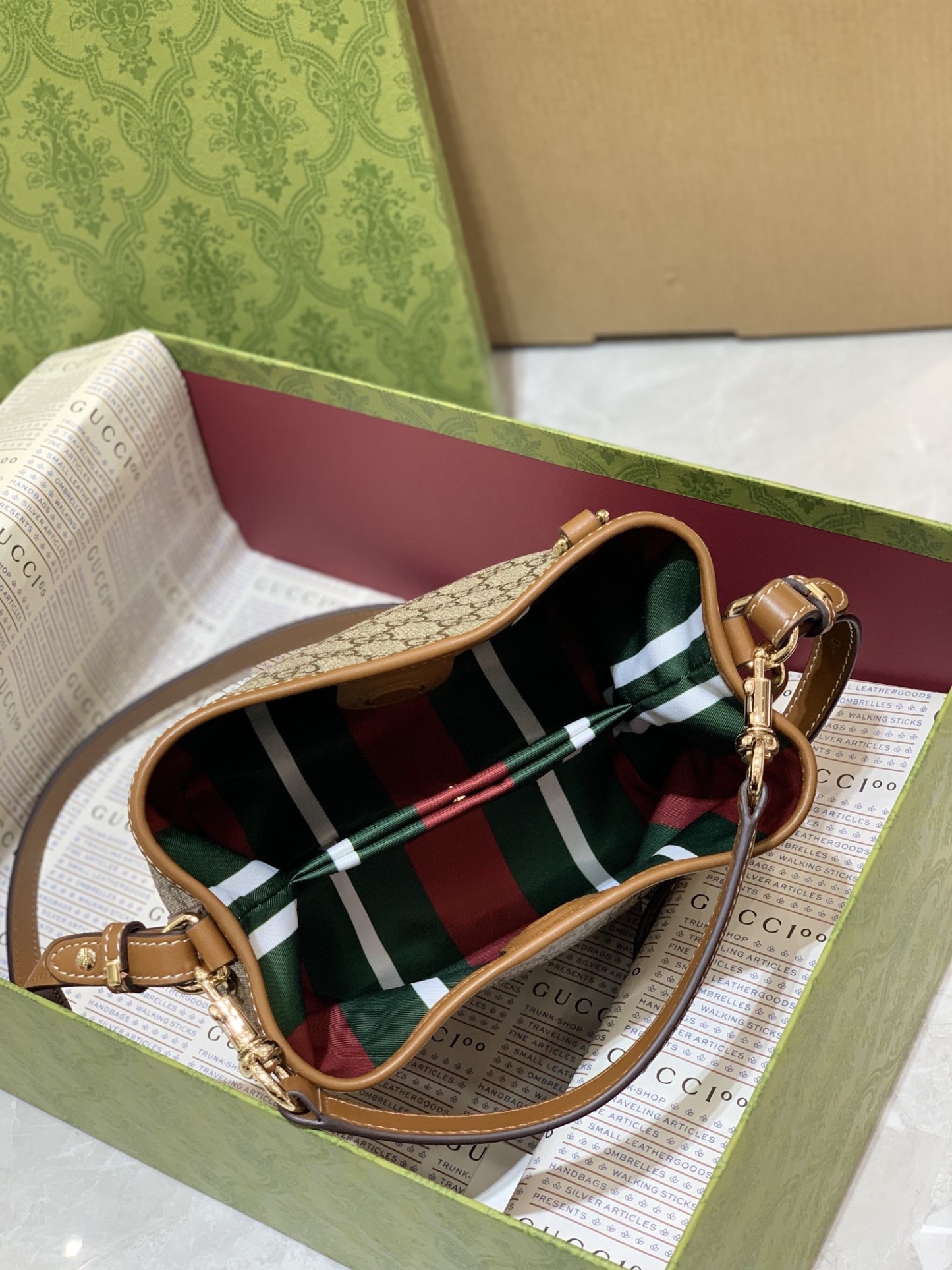 GUCCI GG EMBLEM MINI BUCKER BAG