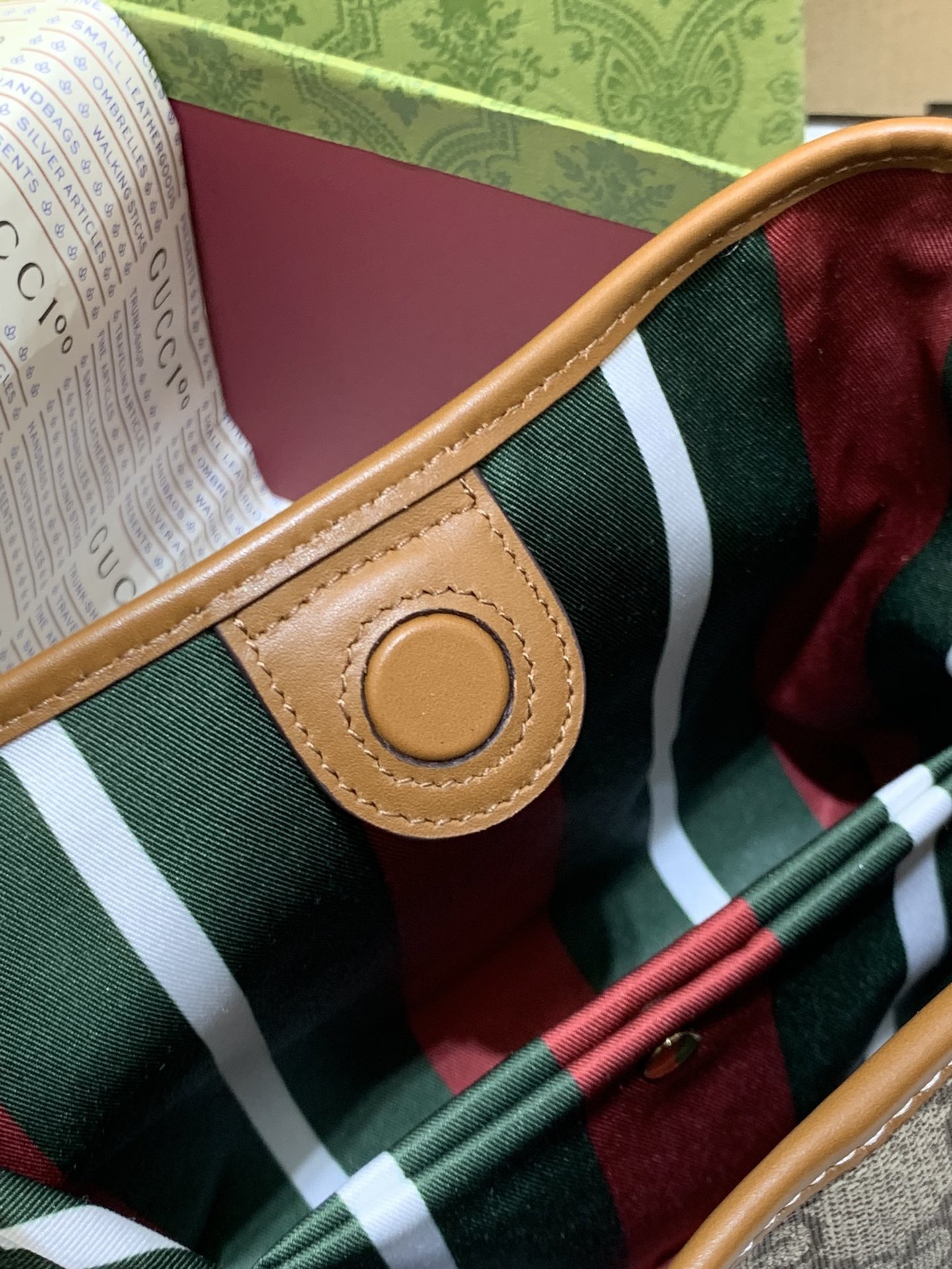GUCCI GG EMBLEM MINI BUCKER BAG