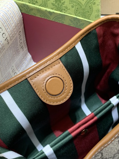 GUCCI GG EMBLEM MINI BUCKER BAG