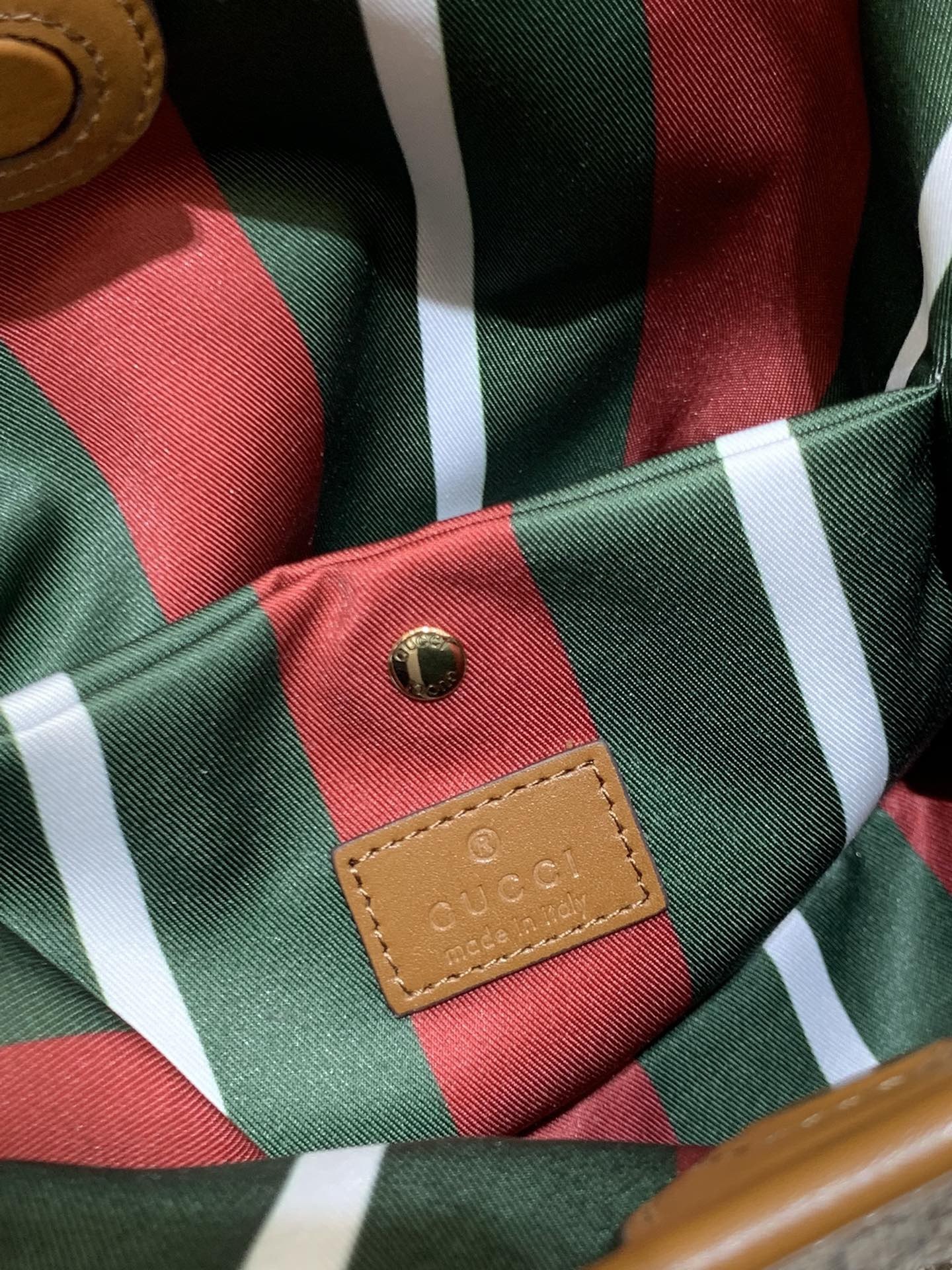 GUCCI GG EMBLEM MINI BUCKER BAG