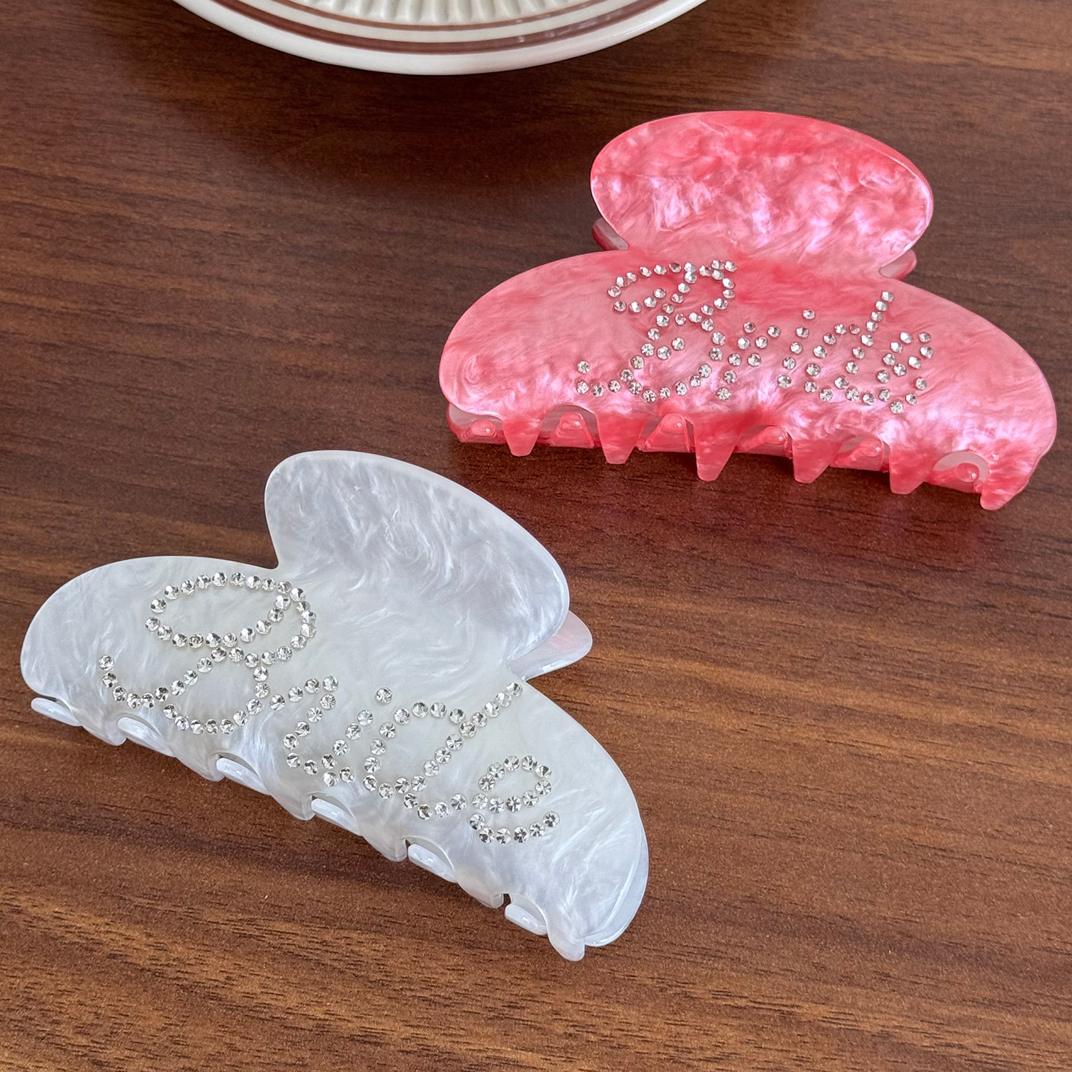 Rhinestone-encrusted acrylic hair clip