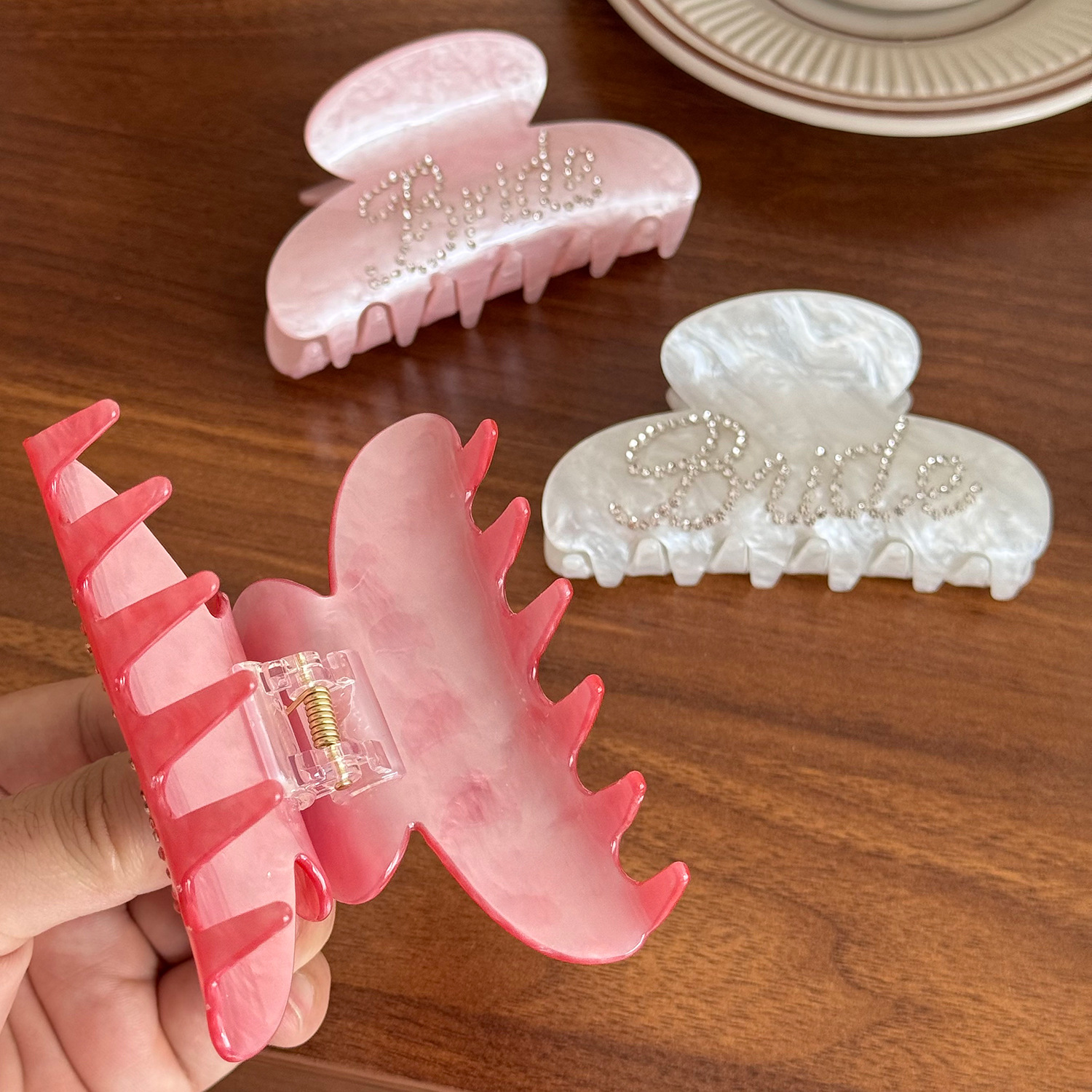 Rhinestone-encrusted acrylic hair clip